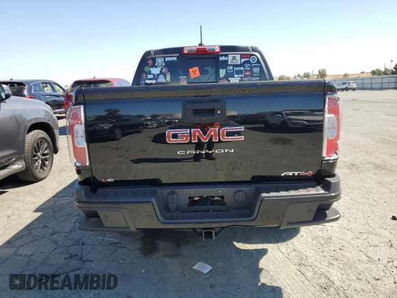 2021 GMC Canyon 4WD AT4 w/Cloth with VIN 1GTG6FEN4M1268263, listed as a Copart auction lot 72393764 with 42,249 mi miles and Salvage Title. Bid and sale history available at carsss.com. Image 6.