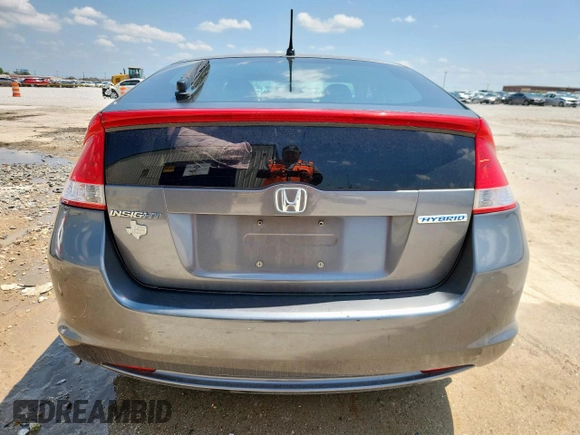 2010 Honda Insight LX with VIN JHMZE2H52AS043392, listed as a Copart auction lot 61347625 with 194,248 mi miles and Salvage title. Bid and sale history available at DreamBid. Image 6.