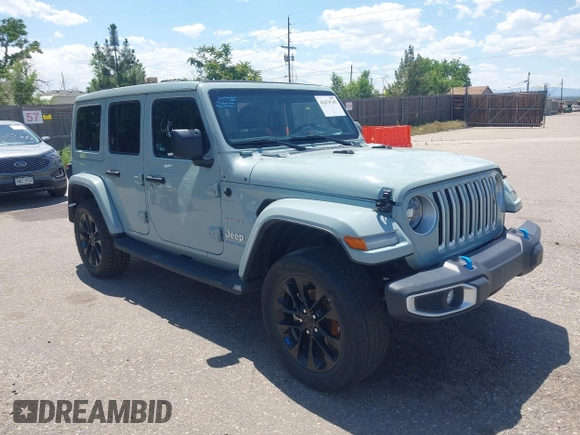 2023 Jeep Wrangler Sahara with VIN 1C4JJXP68PW627007, listed as a IAAI auction lot 42474745 with 57,912 mi miles and . Bid and sale history available at DreamBid. Image 1.