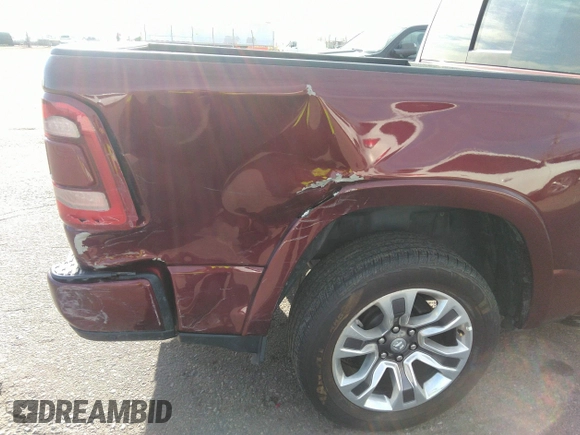 2023 Ram 1500 Limited with VIN 1C6SRFHT2PN542365, listed as a IAAI auction lot 41898998 with 26,607 mi miles and . Bid and sale history available at DreamBid. Image 6.