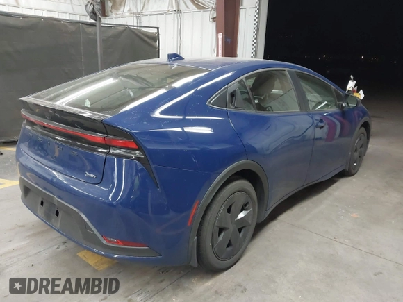 2024 Toyota Prius LE with VIN JTDACAAU0R3030582, listed as a IAAI auction lot 41838615 with 9,402 mi miles and . Bid and sale history available at DreamBid. Image 4.