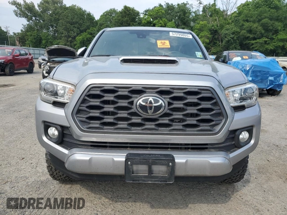 2020 Toyota Tacoma SR5 z VIN 3TMCZ5AN7LM302123, wystawiony jako Copart lot #57299805 z przebiegiem 43 244 mil mil oraz Szkoda całkowita • Salvage title. Historia ofert i sprzedaży dostępna na DreamBid. Obrazek 5.
