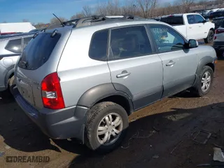 2008 Hyundai Tucson SE with VIN KM8JN12D28U893722, listed as a IAAI auction lot 41680413 with 150,659 mi miles. Bid and sale history available at carsss.com. Image 4.