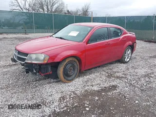 2014 Dodge Avenger SE with VIN 1C3CDZAB0EN220002, listed as a IAAI auction lot 41719914 with 165,330 mi miles and . Bid and sale history available at DreamBid. Image 2.