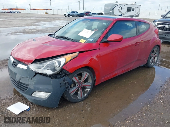 2015 Hyundai Veloster z VIN KMHTC6AD8FU227474, wystawiony jako IAAI lot #42188164 z przebiegiem 122 485 mil mil oraz . Historia ofert i sprzedaży dostępna na DreamBid. Obrazek 2.