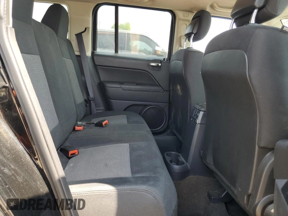 2014 Jeep Patriot Latitude with VIN 1C4NJRFB3ED761587, listed as a Copart auction lot 60554245 with 138,763 mi miles and Salvage title. Bid and sale history available at DreamBid. Image 11.