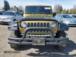 2008 Jeep Wrangler Unlimited X with VIN 1J4GA39118L528479, listed as a Copart auction lot 50953825 with 171,156 mi miles and Salvage Title. Bid and sale history available at carsss.com. Image 5.