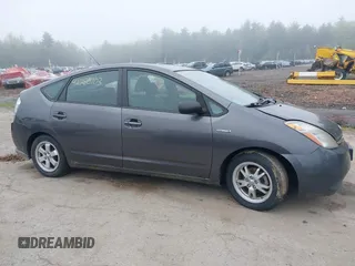 2007 Toyota Prius z VIN JTDKB20U473285795, wystawiony jako IAAI lot #42280703 z przebiegiem Nie podano mil oraz . Historia ofert i sprzedaży dostępna na DreamBid. Obrazek 14.