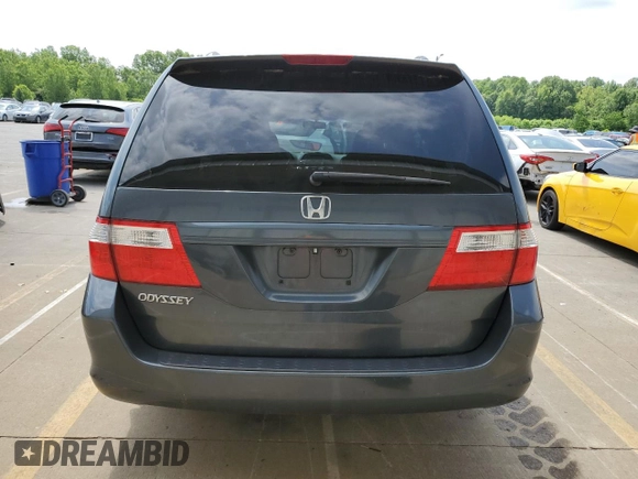 2006 Honda Odyssey EX with VIN 5FNRL38416B446272, listed as a Copart auction lot 57165545 with 219,042 mi miles and Salvage title. Bid and sale history available at DreamBid. Image 6.