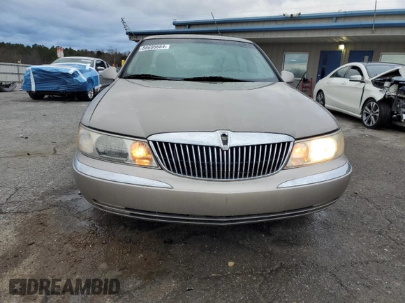 2001 Lincoln Continental z VIN 1LNHM97V41Y633841, wystawiony jako Copart lot #86695664 z przebiegiem 166 931 mil mil oraz Szkoda całkowita • Salvage title. Historia ofert i sprzedaży dostępna na DreamBid. Obrazek 5.