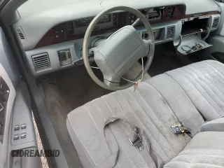1991 Chevrolet Caprice z VIN 1G1BL83EXMW257393, wystawiony jako Copart lot #85267614 z przebiegiem 195 128 mil mil oraz Nie do naprawy • Non repairable. Historia ofert i sprzedaży dostępna na DreamBid. Obrazek 8.