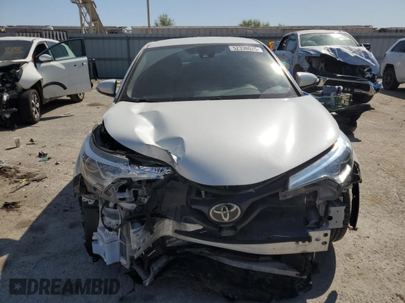 2019 Toyota C-HR XLE with VIN NMTKHMBX2KR098238, listed as a Copart auction lot 52338025 with 57,933 mi miles and Salvage Title. Bid and sale history available at DreamBid. Image 5.