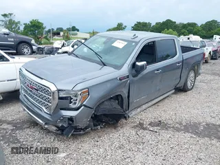 2019 GMC Sierra 1500 Denali with VIN 1GTU9FEL7KZ355632, listed as a IAAI auction lot 42487913 with 51,467 mi miles and . Bid and sale history available at DreamBid. Image 18.