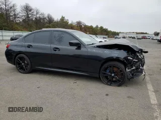 2021 BMW 3 Series M340i xDrive with VIN 3MW5U9J02M8B63206, listed as a Copart auction lot 75713254 with 33,876 mi miles and Salvage Title. Bid and sale history available at carsss.com. Image 4.