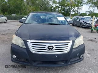 2010 Toyota Avalon XL with VIN 4T1BK3DB1AU353725, listed as a IAAI auction lot 41984608 with 153,759 mi miles and . Bid and sale history available at carsss.com. Image 13.