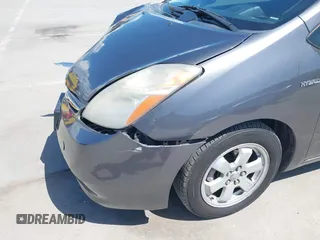 2007 Toyota Prius z VIN JTDKB20U273215633, wystawiony jako IAAI lot #41955538 z przebiegiem 172 957 mil mil oraz . Historia ofert i sprzedaży dostępna na DreamBid. Obrazek 17.