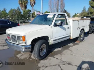 1989 GMC Sierra 1500 with VIN 1GTGC24K2KE504519, listed as a IAAI auction lot 41739839 with 306,714 mi miles and . Bid and sale history available at DreamBid. Image 2.