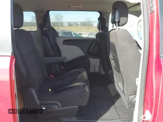 2014 Dodge Grand Caravan SXT with VIN 2C4RDGCG6ER477008, listed as a IAAI auction lot 41770610 with 89,843 mi miles and . Bid and sale history available at DreamBid. Image 8.
