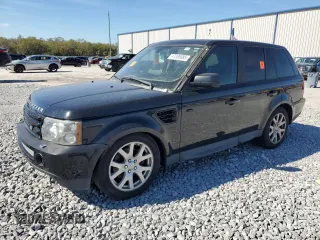 2006 Land Rover Range Rover Sport HSE z VIN SALSF25446A974185, wystawiony jako Copart lot #47285385 z przebiegiem 178 600 mil mil oraz Szkoda całkowita • Salvage title. Historia ofert i sprzedaży dostępna na DreamBid. Obrazek 1.