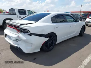 2015 Dodge Charger RT z VIN 2C3CDXCT4FH745861, wystawiony jako IAAI lot #42206349 z przebiegiem 136 061 mil mil oraz . Historia ofert i sprzedaży dostępna na DreamBid. Obrazek 4.