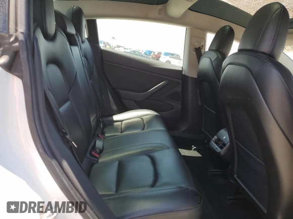 2019 Tesla Model 3 Mid Range z VIN 5YJ3E1EA3KF402556, wystawiony jako Copart lot #56212875 z przebiegiem 89 022 mil mil oraz Szkoda całkowita • Salvage title. Historia ofert i sprzedaży dostępna na DreamBid. Obrazek 10.