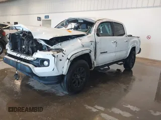 2020 Toyota Tacoma SR5 with VIN 3TMAZ5CN5LM124703, listed as a IAAI auction lot 41017478 with 47,627 mi miles and . Bid and sale history available at DreamBid. Image 2.