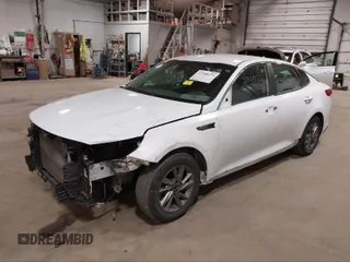 2020 Kia Optima LX with VIN 5XXGT4L33LG382675, listed as a IAAI auction lot 41574386 with 122,732 mi miles and . Bid and sale history available at DreamBid. Image 2.