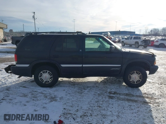 1999 GMC Jimmy SLE with VIN 1GKDT13W5X2520020, listed as a IAAI auction lot 41337936 with 277,615 mi miles. Bid and sale history available at carsss.com. Image 13.