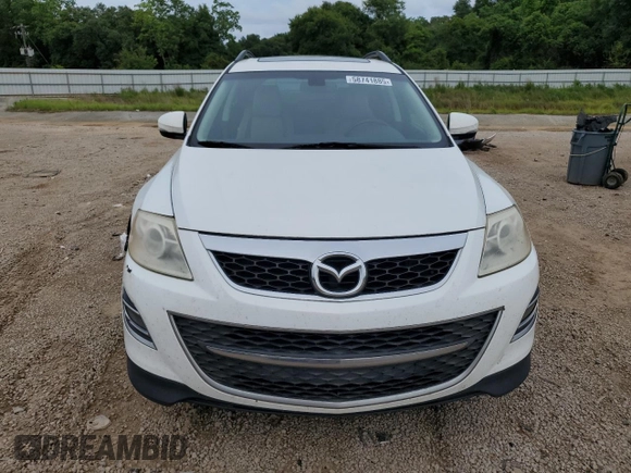 2012 Mazda CX-9 Grand Touring z VIN JM3TB2DA7C0358374, wystawiony jako Copart lot #58741885 z przebiegiem 127 162 mil mil oraz Czysty tytuł • Clean title. Historia ofert i sprzedaży dostępna na DreamBid. Obrazek 5.