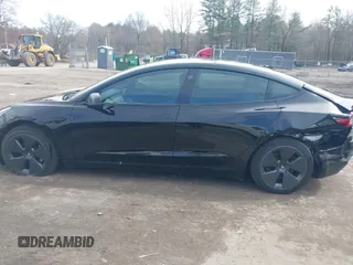 2022 Tesla Model 3 Long Range with VIN 5YJ3E1EBXNF177128, listed as a IAAI auction lot 41966089 with 75,140 mi miles and . Bid and sale history available at DreamBid. Image 14.