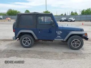 2004 Jeep Wrangler X with VIN 1J4FA39S64P726711, listed as a IAAI auction lot 42227336 with Not Provided miles and . Bid and sale history available at DreamBid. Image 13.