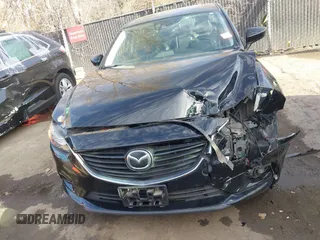 2014 Mazda 6 i Grand Touring with VIN JM1GJ1W66E1162519, listed as a IAAI auction lot 41801957 with 121,586 mi miles. Bid and sale history available at carsss.com. Image 6.