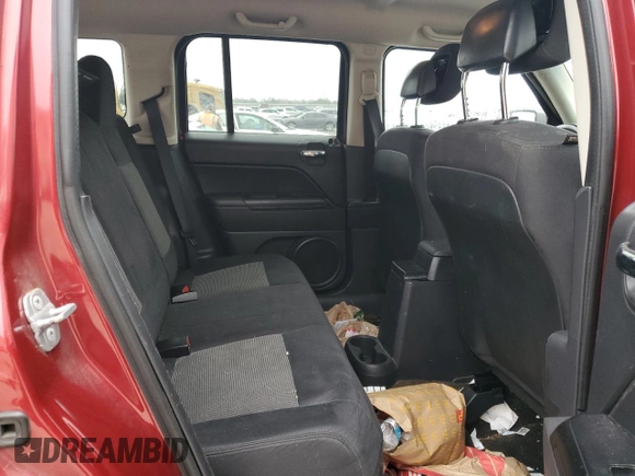 2014 Jeep Patriot Latitude with VIN 1C4NJPFA8ED818233, listed as a Copart auction lot 43947895 with 142,474 mi miles and Salvage Title. Bid and sale history available at carsss.com. Image 10.