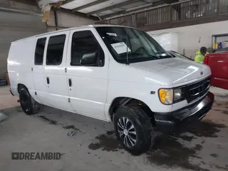 2002 Ford Econoline Cargo with VIN 1FTNE24L02HB72721, listed as a IAAI auction lot 41426289 with 370,018 mi miles and . Bid and sale history available at DreamBid. Image 1.