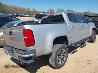 2019 Chevrolet Colorado 2WD Work Truck with VIN 1GCGSBEA7K1159780, listed as a IAAI auction lot 41901126 with 154,626 mi miles. Bid and sale history available at carsss.com. Image 4.