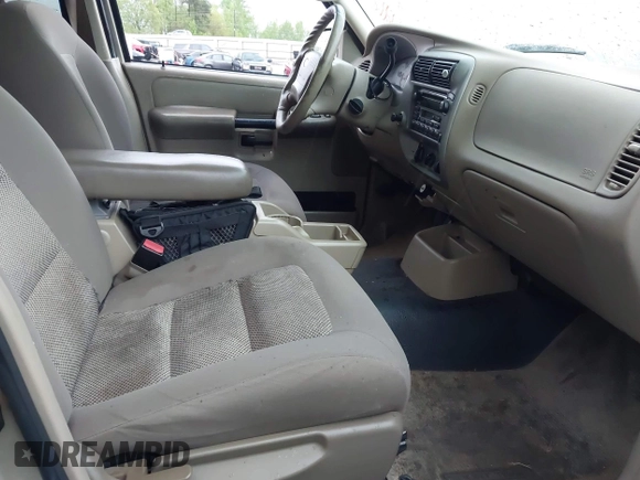 2003 Ford Explorer Sport Trac XLS z VIN 1FMZU67E73UC81240, wystawiony jako IAAI lot #41980985 z przebiegiem 114 644 mil mil oraz . Historia ofert i sprzedaży dostępna na DreamBid. Obrazek 5.