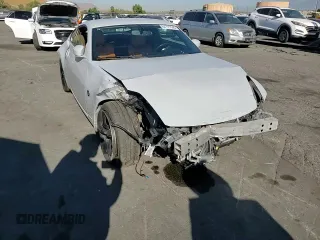 2008 Nissan 350Z Touring z VIN JN1BZ34EX8M753158, wystawiony jako Copart lot #57711145 z przebiegiem 113 142 mil mil oraz Szkoda całkowita • Salvage title. Historia ofert i sprzedaży dostępna na DreamBid. Obrazek 13.