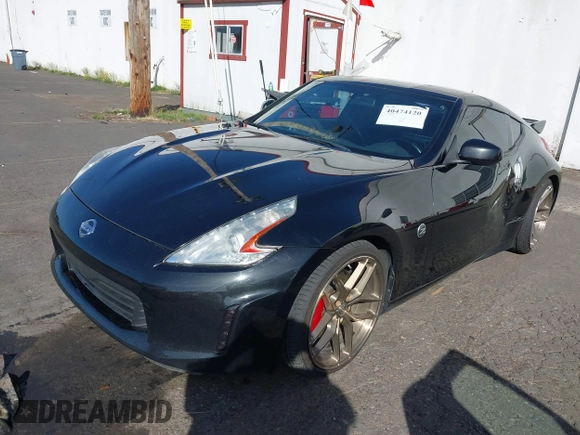 2013 Nissan 370Z z VIN JN1AZ4EH1DM880739, wystawiony jako IAAI lot #40474120 z przebiegiem 76 369 mil mil oraz . Historia ofert i sprzedaży dostępna na DreamBid. Obrazek 17.