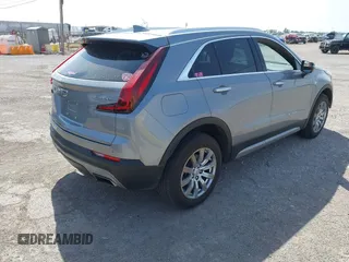 2023 Cadillac XT4 AWD Premium Luxury with VIN 1GYFZDR47PF163923, listed as a IAAI auction lot 42136236 with 52,012 mi miles and . Bid and sale history available at DreamBid. Image 4.