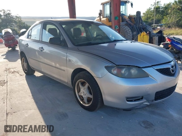 2007 Mazda Mazda3 i Sport with VIN JM1BK12F371721654, listed as a IAAI auction lot 42019268 with 120,518 mi miles. Bid and sale history available at carsss.com. Image 1.