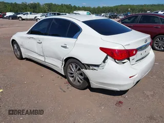 2014 Infiniti Q50 Premium with VIN JN1BV7AR0EM686530, listed as a IAAI auction lot 40381908 with 228,156 mi miles. Bid and sale history available at carsss.com. Image 3.