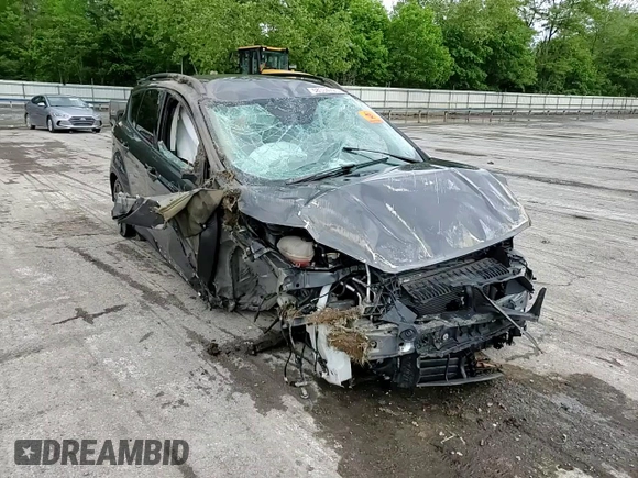 2017 Ford Escape SE z VIN 1FMCU9GD7HUB76204, wystawiony jako Copart lot #58334725 z przebiegiem Nie podano mil oraz Szkoda całkowita • Salvage title. Historia ofert i sprzedaży dostępna na DreamBid. Obrazek 13.