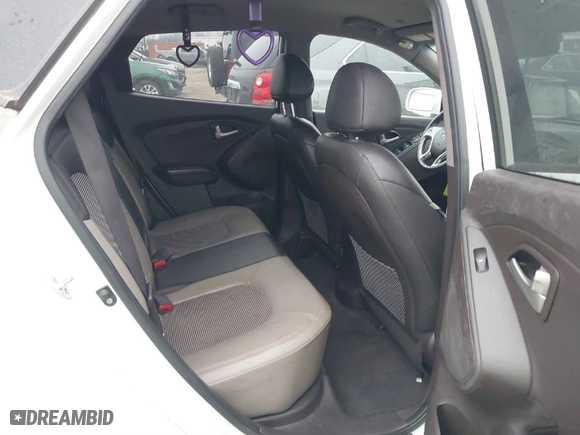 2013 Hyundai Tucson GLS with VIN KM8JU3AC2DU561443, listed as a IAAI auction lot 41600727 with 179,694 mi miles. Bid and sale history available at carsss.com. Image 8.