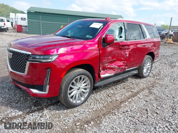 2021 Cadillac Escalade Premium Luxury z VIN 1GYS4BKL6MR453583, wystawiony jako IAAI lot #42129264 z przebiegiem 11 322 mil mil oraz . Historia ofert i sprzedaży dostępna na DreamBid. Obrazek 17.