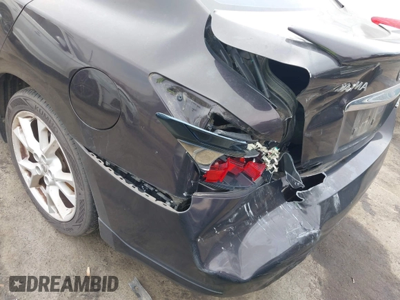 2013 Nissan Maxima S with VIN 1N4AA5AP6DC841261, listed as a IAAI auction lot 41673912 with 191,500 mi miles and . Bid and sale history available at DreamBid. Image 12.
