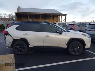 2021 Toyota RAV4 Hybrid XSE with VIN 4T3E6RFV8MU056524, listed as a IAAI auction lot 41788452 with 56,751 mi miles. Bid and sale history available at carsss.com. Image 14.