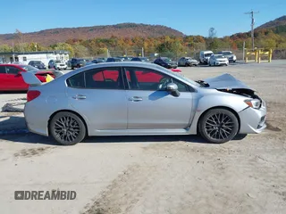 2016 Subaru WRX STI z VIN JF1VA2M66G9801668, wystawiony jako IAAI lot #40666254 z przebiegiem 80 686 mil mil oraz . Historia ofert i sprzedaży dostępna na DreamBid. Obrazek 13.