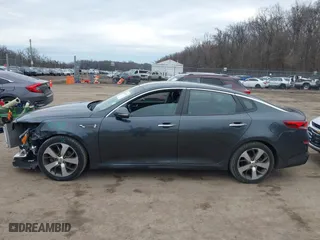 2019 Kia Optima LX with VIN 5XXGT4L33KG379368, listed as a IAAI auction lot 41487477 with 71,868 mi miles. Bid and sale history available at carsss.com. Image 14.