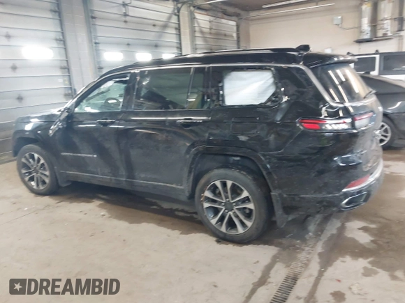 2021 Jeep Grand Cherokee Overland with VIN 1C4RJKDG8M8164904, listed as a IAAI auction lot 41352092 with 57,707 mi miles and . Bid and sale history available at DreamBid. Image 14.