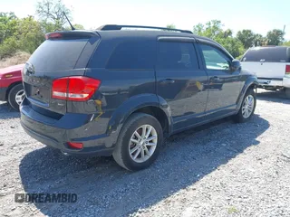 2018 Dodge Journey SXT with VIN 3C4PDCBG7JT172075, listed as a IAAI auction lot 41840766 with 64,572 mi miles and . Bid and sale history available at carsss.com. Image 4.